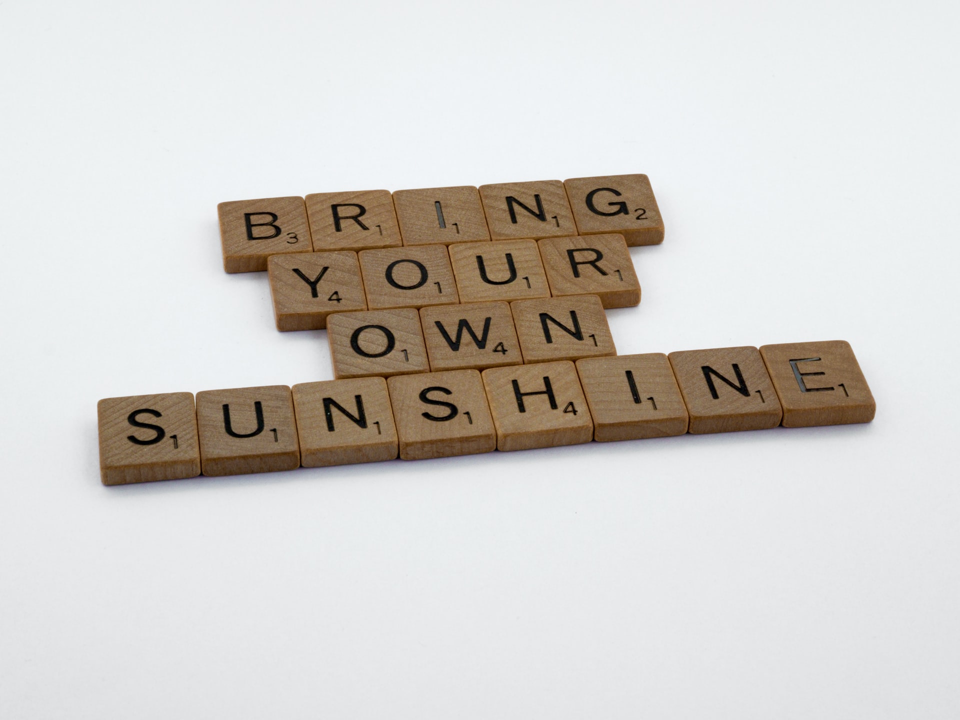 brown scrabble letters bring your own sunshine white background